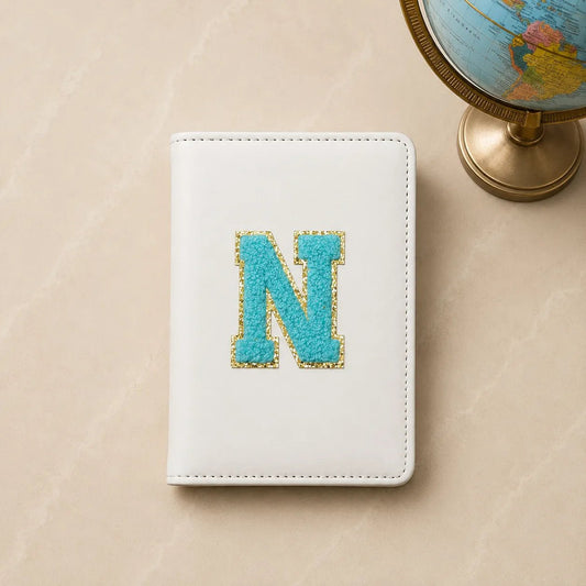 Personalized white passport cover with chenille initial patch