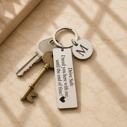 Personalized stainless steel Drive Safe keychain with engraved message and custom initial charm