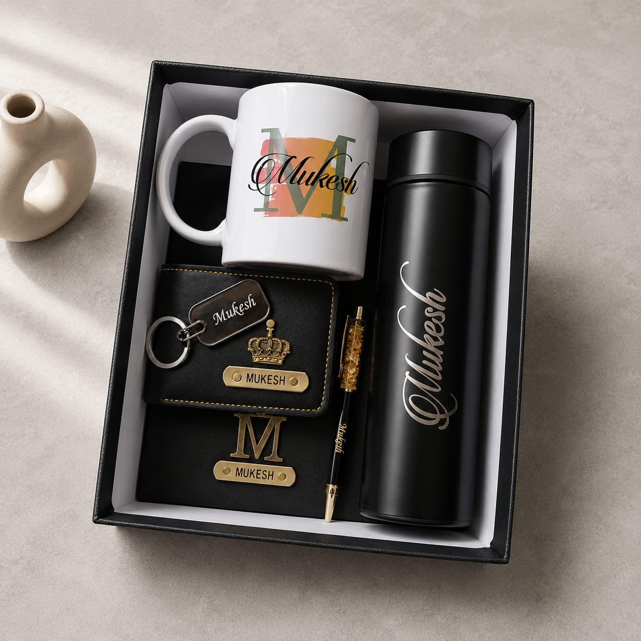 Personalized Executive Gift Set with customized mug, LED temperature bottle, men's wallet, passport cover, metal keychain and gold flake pen.