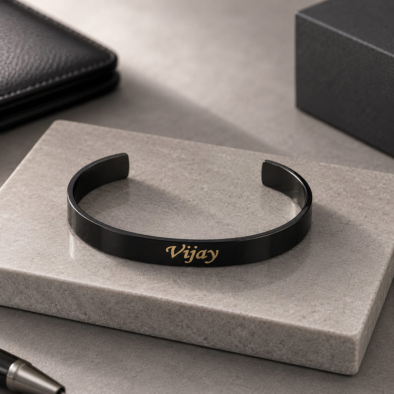 Matte Black Personalized stainless steel half kada bracelet with custom name engraving and adjustable open-cuff design.