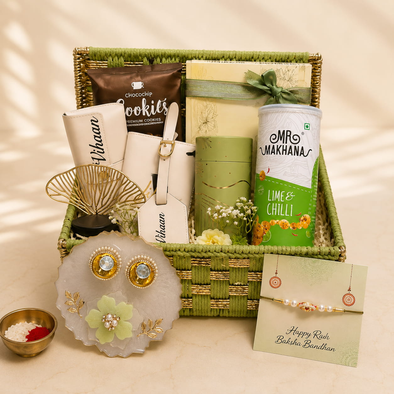 Personalized Heritage Rakhi Gift Hamper for Brother with passport cover, sunglasses cover, luggage tag, cookies, chocolates, pooja thali and designer rakhi.