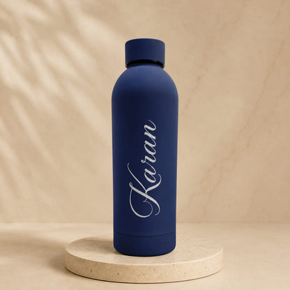 Personalized matte insulated water bottle customized with name in multiple colors.