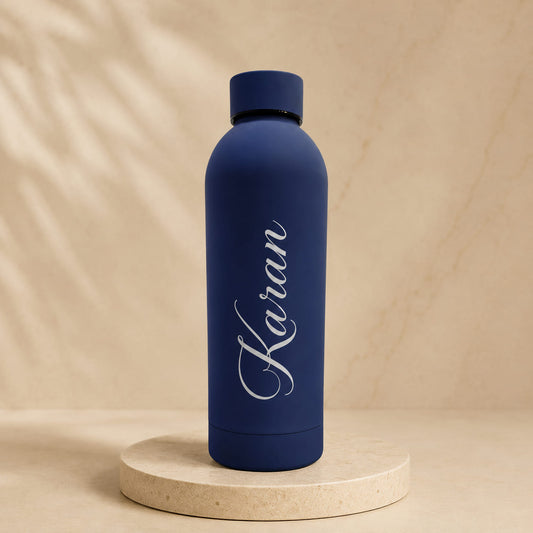 Personalized matte insulated water bottle customized with name in multiple colors.