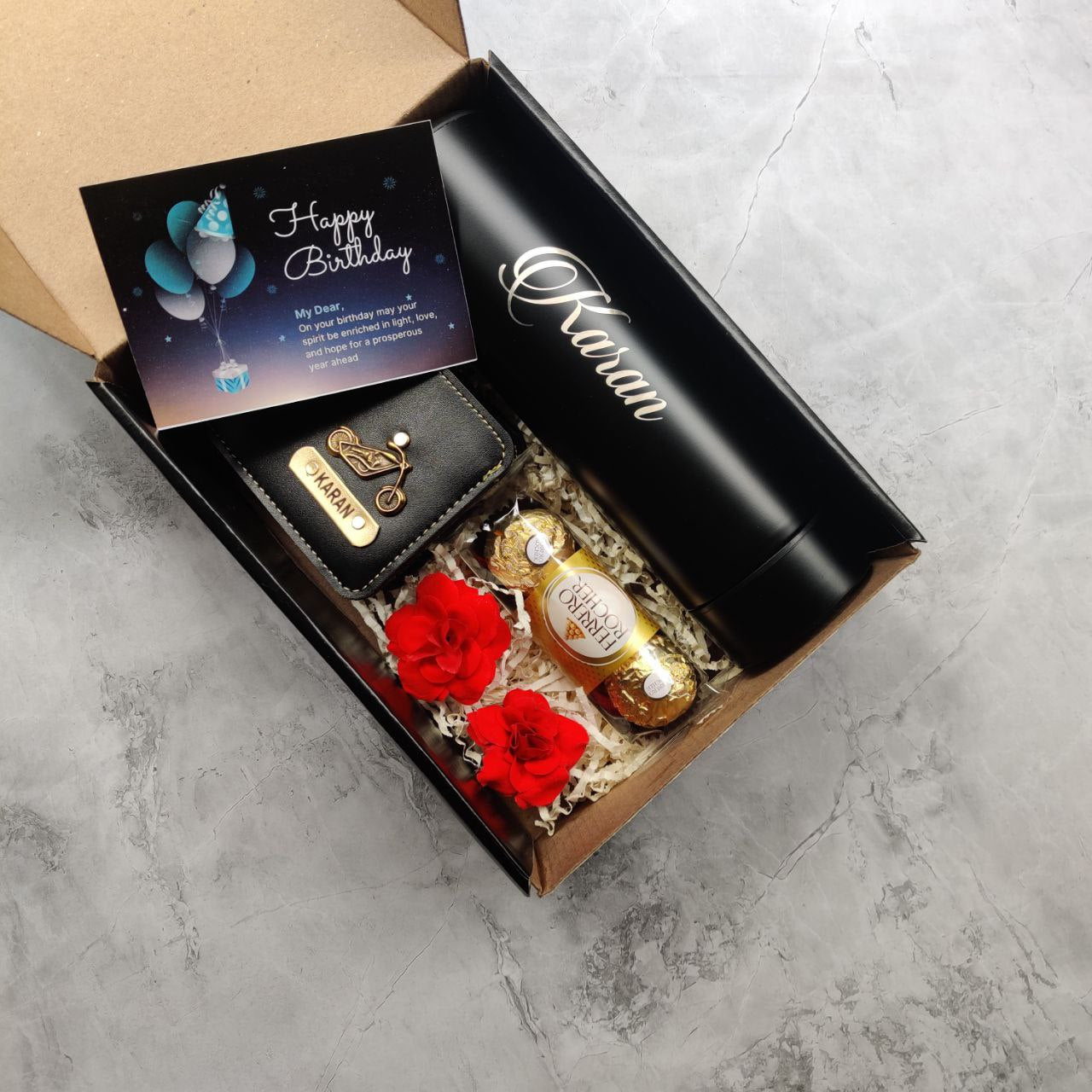 Personalized Birthday Gift Box for Him Black Edition with custom wallet, LED bottle, Ferrero Rocher chocolates, and birthday card.