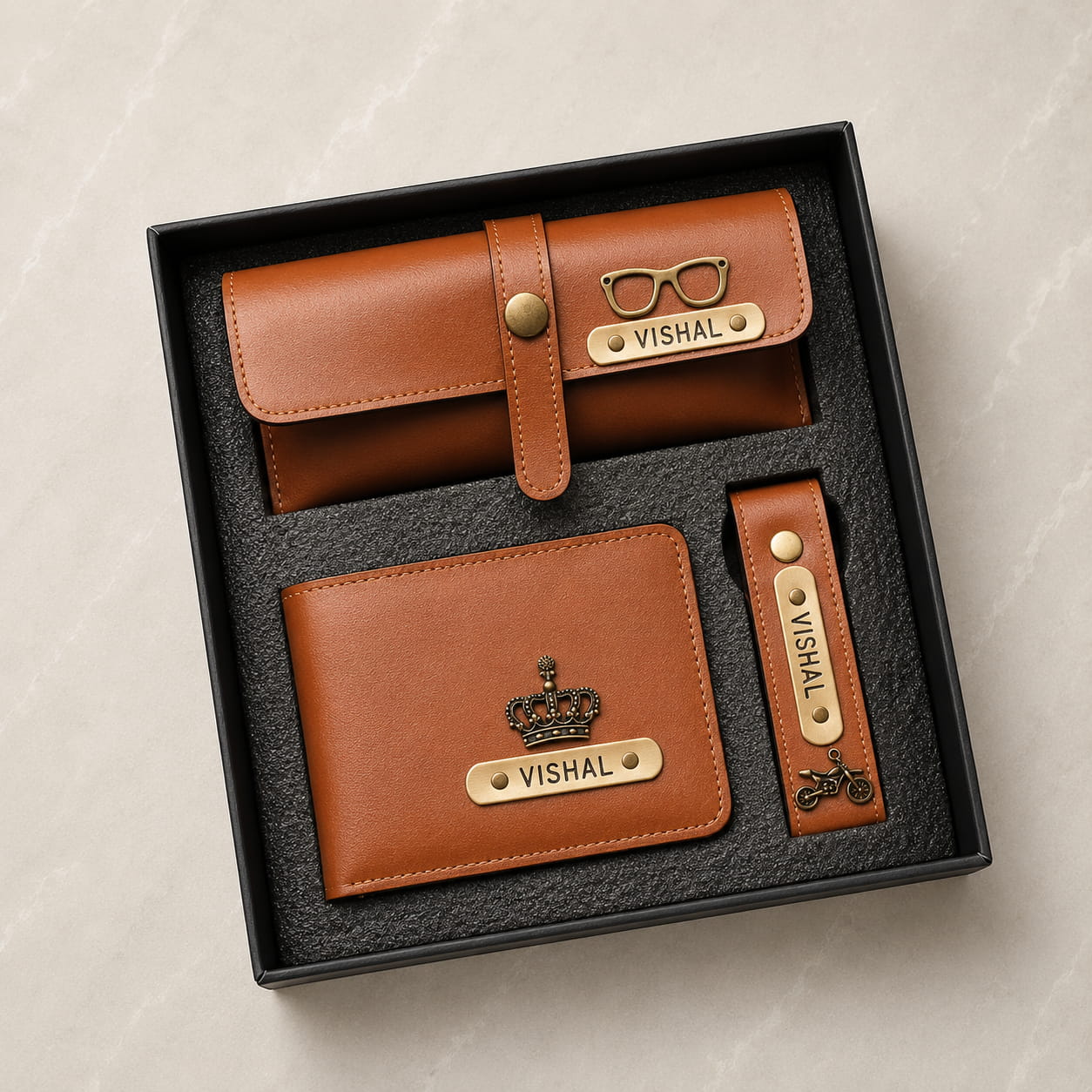 Personalized men's wallet, sunglass holder and keychain combo gift set with custom name and charm in premium vegan leather.