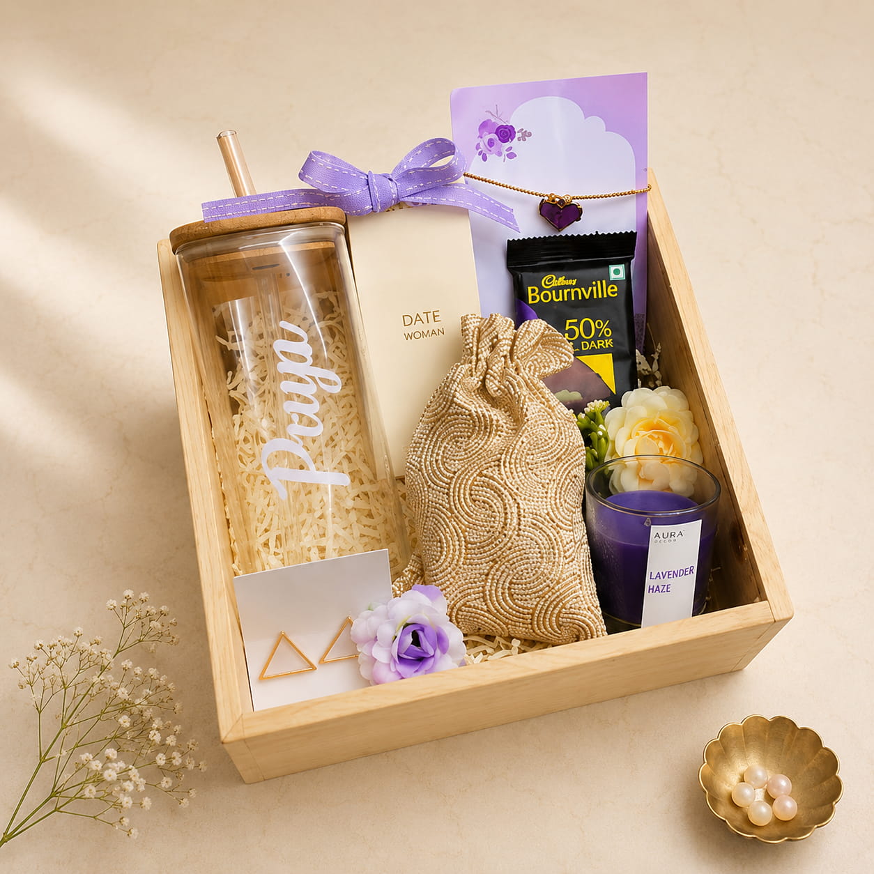 Personalized Pamper Rakhi Gift Hamper for Sister with custom glass sipper, Bella Vita perfume, candle, earrings, bracelet and chocolates