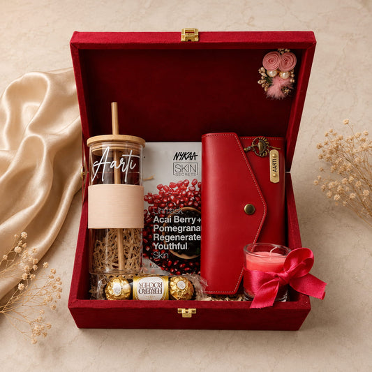 Personalized Women's Deluxe Gift Hamper with customized women's wallet, personalized glass tumbler, chocolates, scented candle and premium velvet trunk box.