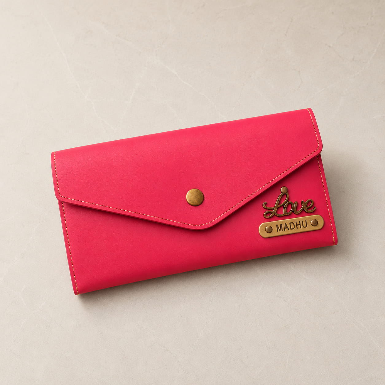 Pink personalized women's clutch wallet with custom name plate and love charm