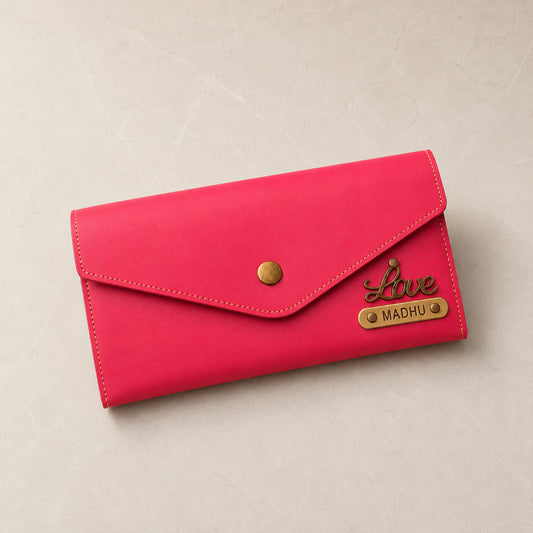 Pink personalized women's clutch wallet with custom name plate and love charm